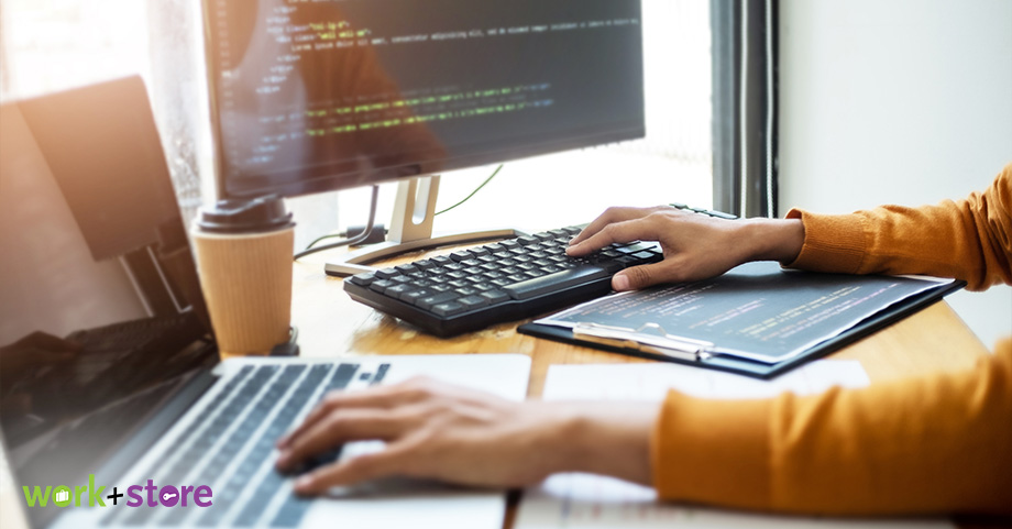 Image of a person backing up data of her Computer