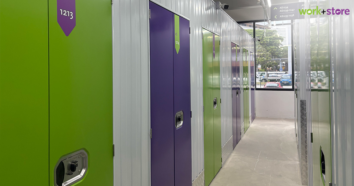 Clean storage facility hallway with secure lockers for event inventory.